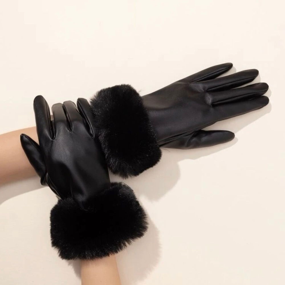 Black leather gloves with fluffy black around them.